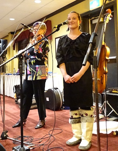 Heather Daley, on the violin, accompanies Rachel Michael, an Inuksuk High School student, in her performance of 