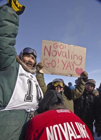 Novalinga Novalinga celebrates his win at the finish line in Puvirnituq March 26. (PHOTO BY PIERRE DUNNIGAN/IVAKKAK)
