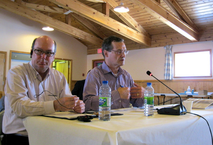 Nunavut Finance Minister Keith Peterson answers questions from Baffin mayors and senior administrative officers with deputy minister Chris D’Arcy during the mayors' forum in Iqaluit March 19. (PHOTO BY PETER VARGA)