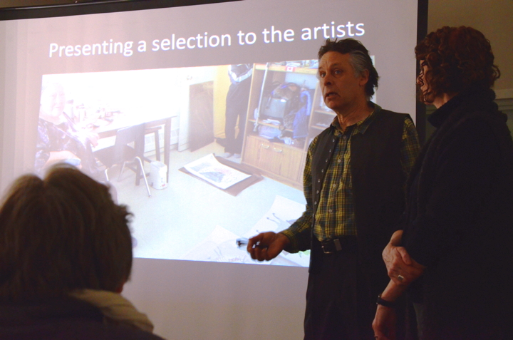 Peter Machnik speaks to a crowd of 35 people Feb. 28 about his recent printmaking workshop in Cape Dorset which occurred earlier in February. (PHOTO BY DAVID MURPHY)