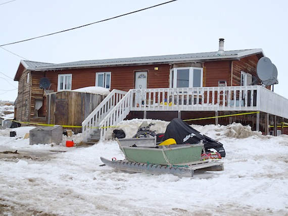 Apart from the yellow police tape, this house, where an armed standoff took place for more than 40 hours between April 28 and April 30, looked as peaceful as any other house in the normally peaceful Iqaluit neighbourhood of Happy Valley. (PHOTO BY JANE GEORGE)