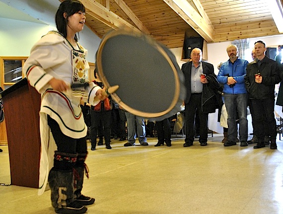 Drum dancer Debbie Oyukuluk performs before an audience of international delegates and curious Iqalungmiut April 25 in Iqaluit’s Anglican Parish Hall, at a community outreach event hosted by organizers of the Arctic Council’s ninth ministerial meeting. Delegates and other visitors were invited to take a last look at arts and crafts by Iqaluit artisans, and meet with Iqalungmiut before before returning home countries after a full day of meetings April 24 at Nunavut’s legislative building. (PHOTO BY PETER VARGA)