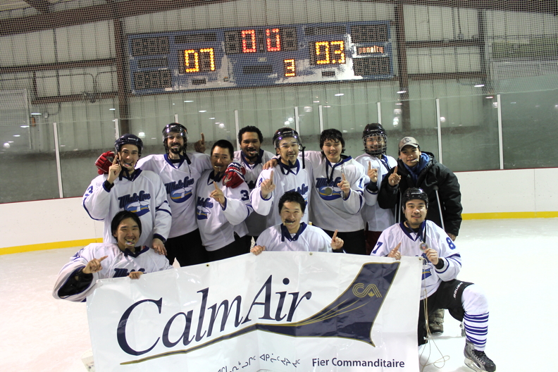 The hometown Whale Cove Whalers celebrate their victory over Rankin Inlet A & R March 29 which means the Johnny Kook Memorial cup will stay in Whale Cove this year. The four-on-four tournament, which ran March 27 to March 29, is held annually to honour the late Johnny Kook, a beloved resident and local hockey fan. Another team from Rankin Inlet, the Inuks, took third place this year. Back row, from left: Joey Arualak, Alex Makin, Dodai Kriterdlik, Chris Jones, Ronnie Ekwalak, Tyson Panika, Mikey Okalik and Simon Enuapik Jr. Front row, from left, Goalie David Oklaga, Luke Kabloona and Darryl Adjuk. (PHOTO BY NOEL KALUDJAK)