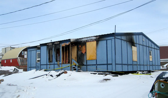 An early morning fire on May 9 destroyed one of four units in this house near Iqaluit’s city centre. (PHOTO BY PETER VARGA)