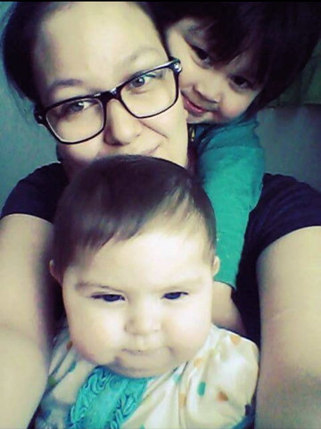 Geelasia Boileau with her daughter Liette, nine months old, and son Chase, who is two-and-a-half. Boileau, born and raised in Iqaluit, is in the middle of earning her high school diploma online through Nunavut Arctic College's Pathway to Adult Secondary School graduation program or PASS. (PHOTO COURTESY GEELASIA BOILEAU)