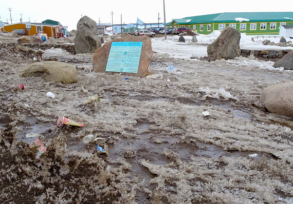 As snow melts at Iqaluit Square, litter is exposed. The reappearance of the winter litter around town means the annual city clean-up, which takes place next month, is just around the corner. (PHOTO BY JANE GEORGE)
