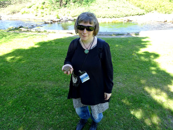 Lena Maria Nilsson, a Saami nutritionist from northern Sweden, came with a round, brown stone to the circumpolar health conference in Oulu, Finland to highlight the connection between culture and health. (PHOTO BY JANE GEORGE)