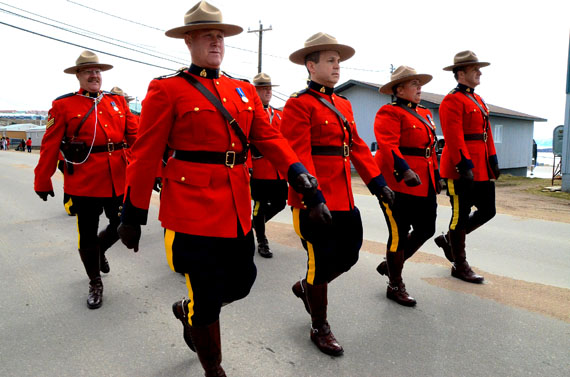Everyone loves a parade. Iqaluit RCMP members march through Iqaluit July 1 in the annual Canada Day parade. The Alianait Arts Festival ended that day with a civic ceremony at the Big Top Tent between 1 p.m. and 2 p.m., followed by a Canada Day Concert featuring Willie Stratton and the Boarding Party, Joanne Ashley and Friends, and Kamaalukutaat from 2 p.m. to 4:30 p.m. Events this year wrapped up with the Artcirq Cabaret festival finale at Nakasuk. (PHOTO BY DAVID MURPHY)