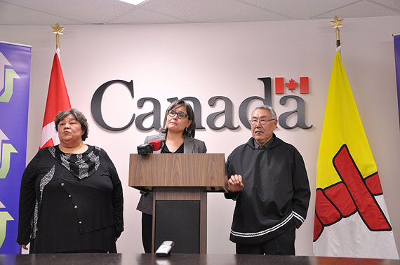 The GN's economic development and transportation minister, Monica Ell, Nunavut MP Leona Aglukkaq and Iqaluit deputy mayor Simon Nattaq take questions from reporters at a news conference in Iqaluit July 30 announcing $84.9 million in possible future spending for an Iqaluit port and small craft harbour. (PHOTO BY THOMAS ROHNER)