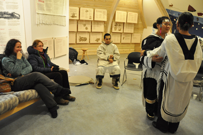 German tourists enjoy a throat singing performance at Arviat’s visitor centre during a 2013 visit to the Kivalliq community. (FILE PHOTO)