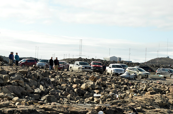 Despite warnings to stay away from the area, Iqalungmiut gathered along the city's causeway July 16 in search of a polar bear spotted wandering through town earlier in the day. But visitors left without a glimpse of the animal. Residents of the Plateau neighbourhood saw a polar bear lumber by during the lunch hour, which reportedly continued heading west towards the causeway. It's the second polar bear to walk through the community this week; wildlife officers killed the first one. (PHOTO BY THOMAS ROHNER) 