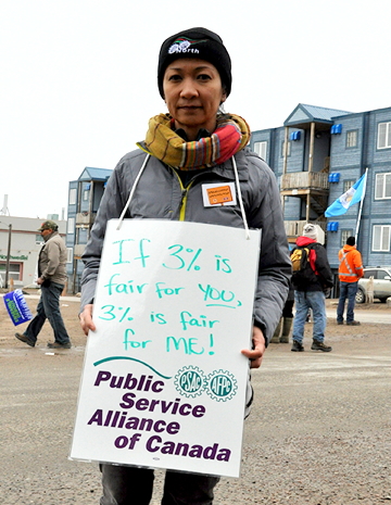 Sheila Papa, a communications manager with QEC, on the picket line in Iqaluit July 16. 
