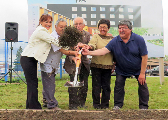 With shovel in hand, Nunavik health officials break ground Sept. 29 at the site of the region’s new Montreal patient transit centre; from left, Northern Quebec Module director Maggie Putulik, Ivujivik patient Mattiusi Iyaituk, Dorval mayor Edgar Rouleau, Nunavik Regional Board of Health and Social Services chair Elisapi Uittangak and Innuulitsivik health care centre chair Aliva Tulugak. Construction will begin this fall on the 143-bed facility, which is expected to open in December 2016. (PHOTO BY BOB MESHER)
