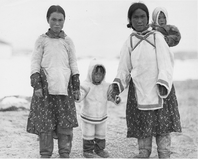 Two unidentified women and two children around 1939. Photographed by Dr. R. L. Sutton. (PHOTO COURTESY HBC ARCHIVES)