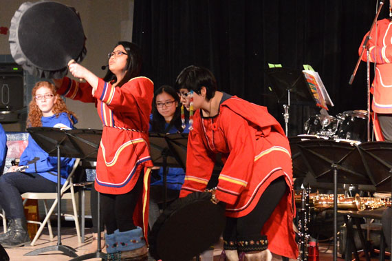 The Inuksuk Drum Dancers perform Nov. 10 at a Remembrance Day ceremony inside Inuksuk High School in Iqaluit. Students treated their audience to a full program of choral music, fiddling, drumming and dramatic interpretations. The school's tisi area was filled to capacity with fellow students and Iqaluit residents who took time out of their day to visit the school in advance of national ceremonies. Iqaluit's main Remembrance Day ceremony will be held at the cadet hall starting at at 10:45 a.m. Nov. 11. (PHOTO BY STEVE DUCHARME)
