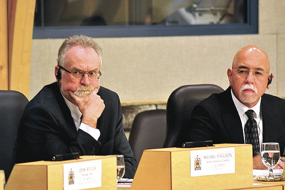 Canada's Auditor General, Michael Ferguson, left, in the Nunavut legislature in May 2015. Ferguson's team of performance auditors will soon turn their attention to Nunavut's health department which comprises more than one fifth of the territory's operational budget at $317.4 million. (FILE PHOTO)