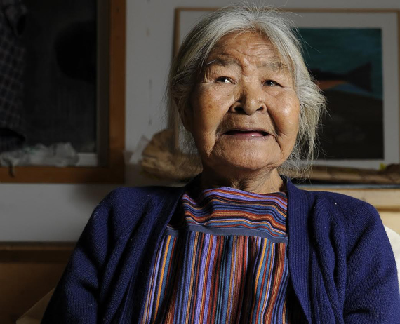 Pangnirtung artist Elisapee Ishulutaq, shown here in a recent photo from the Uqqumiut centre for arts and crafts, is now 90 years old: she celebrated her 90th birthday Oct. 28. Born in 1925 in Kagiqtuqjuaq, Ishulutaq settled in what is now known as Pangnirtung in the late 1960s. That's when she started taking part in the community's new art-making program, quickly building a reputation for her carving and drawings skills. Ishulutaq, whose work is on display at the National Art Gallery in Ottawa, is still drawing to this day. (SUBMITTED PHOTO)