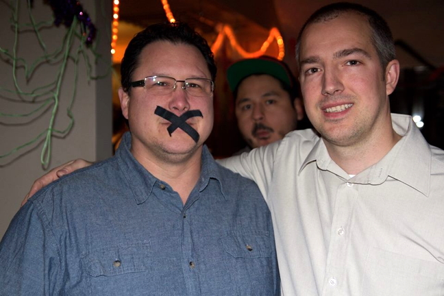 Iqaluit-Tasiluk MLA George Hickes, left, dressed up as Kenny Bell, right, at the Bell comedy roast at Iqaluit's Francophone Centre Oct. 31. Bell had famously taped his mouth shut this summer after feeling he was being censored by the mayor and his council colleagues. (PHOTO BY VINCENT DESROSIERS)