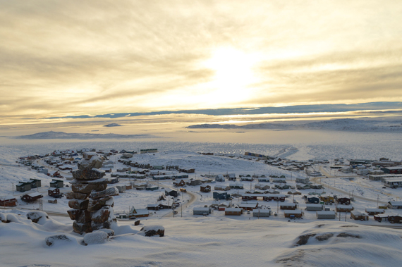 An Arctic sunset: A walk back to work after the lunch hour in Iqaluit might afford you this view of the sun on the horizon, just before it finally sets around 2:30 p.m. Nunavut is just over a month away from its shortest day, the winter solstice, which will fall on Dec. 22. (PHOTO BY STEVE DUCHARME) 
