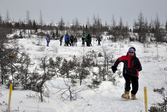 Mary Pootoo, 16, of Salluit, races to the finish line in the 100-metre snowshoe sprint in Kuujjuaq Nov. 28. Pootoo is one of dozens of young athletes in Kuujjuaq this past weekend competing in regional trials, where the top-performing athletes will be selected to represent Nunavik at the 2016 Arctic Winter Games to be held in Nuuk, Greenland next March. Read more later at NunatsiaqOnline.ca. (PHOTO BY SARAH ROGERS)