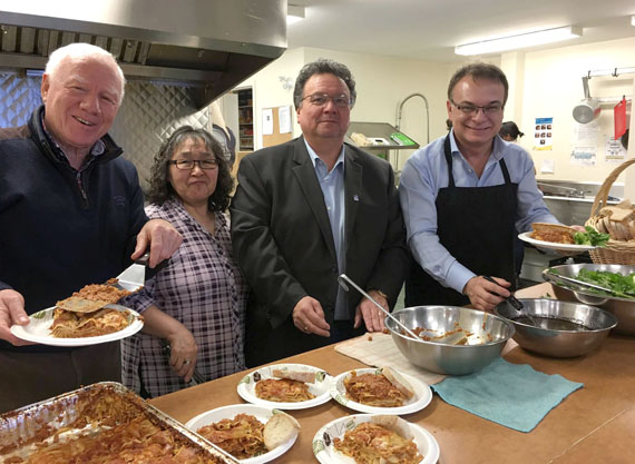 Nunavut premier Peter Taptuna, second from right, and his wife Joanne help to prepare and serve lunch at Iqaluit’s soup kitchen Nov. 26 with centre volunteers. The kitchen, which is operated through the Qayuqtuvik Society, relies exclusively on donated money and food to operate. Its board of directors is currently working on getting the society registered as a charity. (PHOTO COURTESY OF THE GN)
