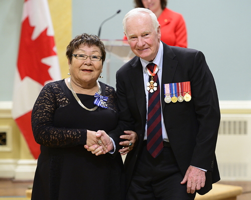 Rebecca Veevee, popular host of the APTN cooking show Nigitsiat, receives congratulations from Governor General David Johnston after Veevee received the Meritorious Service Medal at a ceremony in Ottawa Dec. 11. (PHOTO BY SGT. RONALD DUCHESNE)