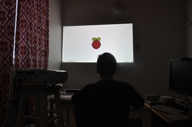 Jamie Griffiths, who helped get Iqaluit's Geek Makers Club off the ground, uses her Raspberry Pi computer through a wall projector in her home Dec. 29. The mini computer is an affordable, efficient computing alternative, perfect for tinkering with, Griffiths said. (PHOTO BY THOMAS ROHNER)