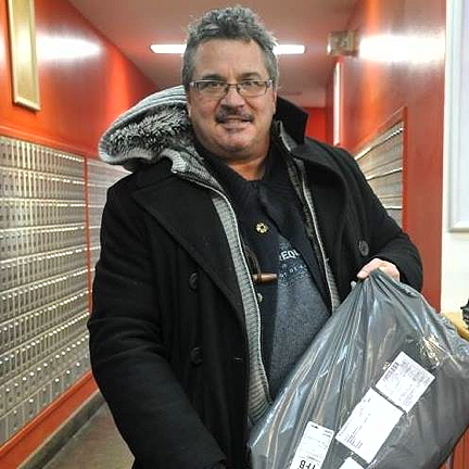 Michael Murphy of Iqaluit picks up another shipment of donations from Canada Post. (PHOTO COURTESY MICHAEL MURPHY)