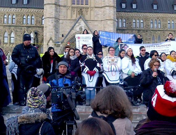 Nunavut Sivuniksavut students hold a vigil for murdered Nunatsiavut student Loretta Saunders in 2014, while calling for an inquiry into murdered and missing Indigenous women. (FILE PHOTO)