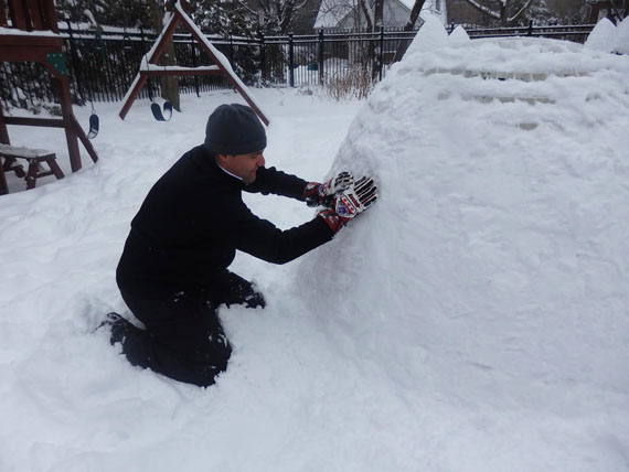 Play Snow creator Eric Villiard fills snow between the grid frame of his igloo structure, a product he's looking for support to manufacture out of Montreal. (PHOTO COURTESY OF PLAY SNOW) 