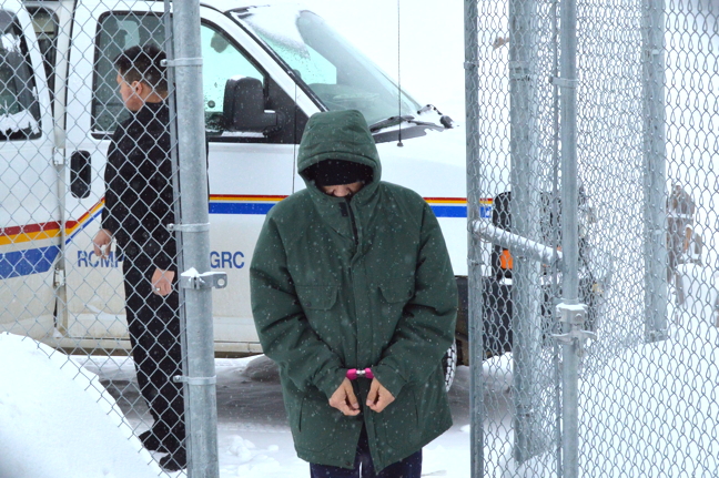 Accused killer Jeffrey Salomonie is escorted into the Nunavut Court of Justice in Iqaluit Feb. 10 at the conclusion of his trial. Salomonie is accused of first-degree murder in the May 2009 death of Daisy Curley. (PHOTO BY STEVE DUCHARME)