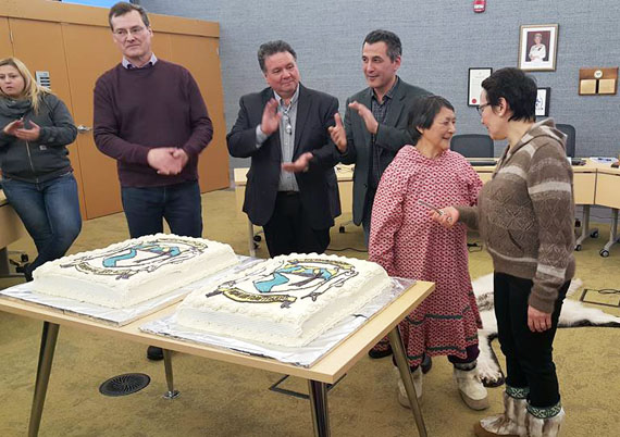 Municipal and territorial leaders gather in Cambridge Bay Feb. 8 to celebrate the Kitikmeot community’s newly-opened hamlet office. From left, Cambridge Bay MLA Keith Peterson, Nunavut Premier Peter Taptuna and Nunavut MP Hunter Tootoo look on while Cambridge Bay mayor Jeannie Ehaloak prepares to cut cake. The new 651-square-metre space houses all the community’s administrative functions in one building, its 54 employees and a new council chamber with translation booth. The $11.2 million office was jointly funded through the federal and territorial governments. (PHOTO COURTESY OF JEANNIE EHALOAK)