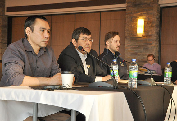 Enookie Inuarak, Olayuk Akesuk and Stephen Williamson-Bathory of the Qikiqtani Inuit Association make a presentation Feb. 18 at the organization's board meeting this week in Iqaluit. (PHOTO BY THOMAS ROHNER)