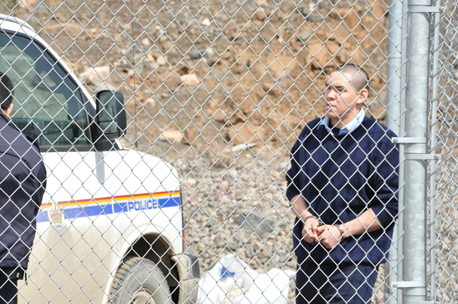 Police escort Peter Kingwatsiak of Cape Dorset to an RCMP truck during a break on day one of his first-degree murder trial in Iqaluit June 22, 2015. Justice Bonnie Tulloch has found him guilty on the first degree murder charge and guilty of aggravated assault on his uncle, in a judgement given Feb. 5. (FILE PHOTO)