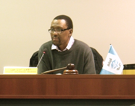 Iqaluit city councillor Kuthula Matshazi at a community economic development meeting Feb. 11 during which the city's new economic development plan was presented to the public. 