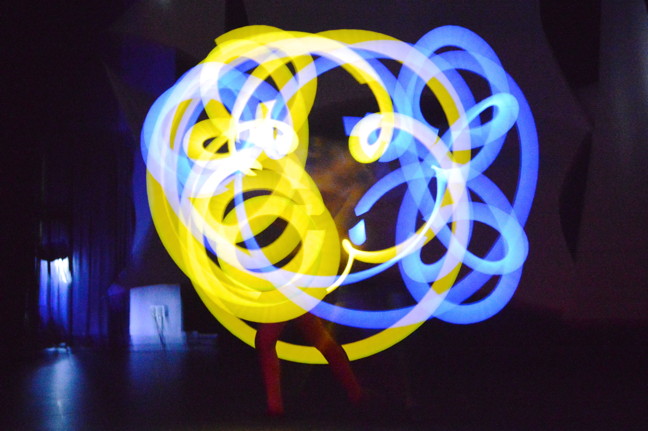 Alaskan baton twirler Heather Werning delights the AWG audience with glowing batons.
