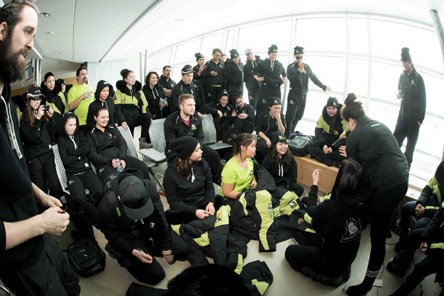 Team Nunavik-Québec athletes amuse themselves with hand games at the Kuujjuaq airport last weekend waiting for the weather to improve so they could fly to Nuuk for the 2016 Arctic Winter Games. (PHOTO COURTESY KATIVIK REGIONAL GOVERNMENT)