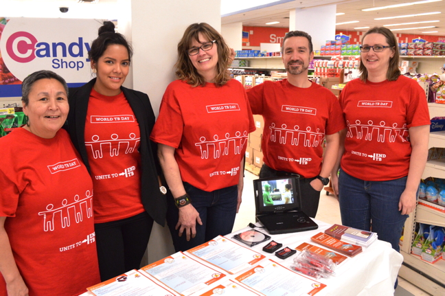 Health care professionals at a booth at Iqaluit's Northmart March 24, World TB Day, to hand out brochures on a new treatment available for latent TB. From left: Martha Mallik, Tina Campbell and Charlene Lavallee from Iqaluit Public Health, Dr. Gonzalo Alvarez and Deborah Van Dyke from the Ottawa Hospital TB Program. (PHOTO BY STEVE DUCHARME)