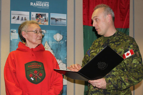 Canadian Ranger Martha Aupaluk, left, receives the Command Commendation in Puvirnituq Feb. 29 in recognition of her long-time support to the Junior Canadian Ranger program in Nunavik. She received the award from Brigadier-General Stéphane Lafaut, at right. The same day, seven other Puvirnituq Rangers from the 2 Canadian Ranger Patrol Group received the third clasp to the Canadian Forces decoration, recognizing their 42 years of services. Read more later at NunatsiaqOnline.ca. (PHOTO BY CPT. KARINE ROY/2CRPG)