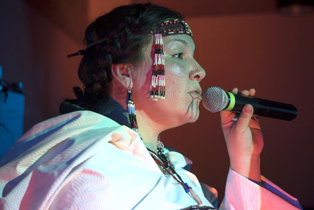 Taqralik Partridge, originally from Kuujjuaq and currently living in Ottawa, performs an original spoken word poem during a performance of
