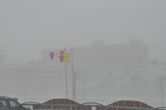 With visibility dropping and winds gusting up to 80 kilometres an hour, much of the city of Iqaluit has shut down the afternoon of April 6. The City of Iqaluit has suspended all municipal services, and is asking residents not to venture outdoors. Following the lunch hour, the Government of Nunavut shut down its offices in Iqaluit, including the community’s schools and courthouse. Federal government offices, Inuit organizations, daycares and many businesses also closed for the afternoon. Fire and Ambulance services will be provided unless it's unsafe and/or impossible to do so, but delays can be expected due to weather conditions, the City said. Environment Canada said the blizzard should clear up overnight. For information updates, Iqalungmiut can call the city’s blizzard line at 979-5300 or the GN’s info line at 975-6444. (PHOTO BY THOMAS ROHNER)