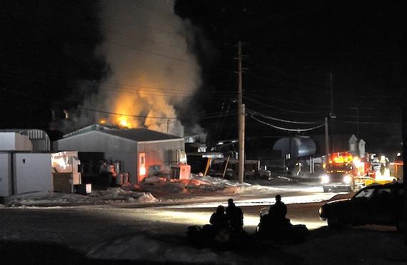 A fire over the Easter weekend last year destroyed Pangnirtung's power plant, leading to a state of emergency. The QEC flew in emergency generators to supply power until a permanent new power plant starts operations in 2017. (FILE PHOTO)