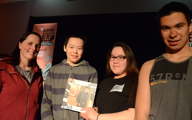 Kangiqsujuaq's Arsaniq School teacher Aurora Gibbons stands with three of her students featured in the latest edition of Quebec Roots, an anthology of Quebeçois students' writing and photography, at a book launch April 15 in Montreal. From left are: Gibbons, Markusie Alaku, 14, Kaudjak Alaku, 16, and Adamie Alaku, 17. (PHOTO BY DAVID MURPHY)