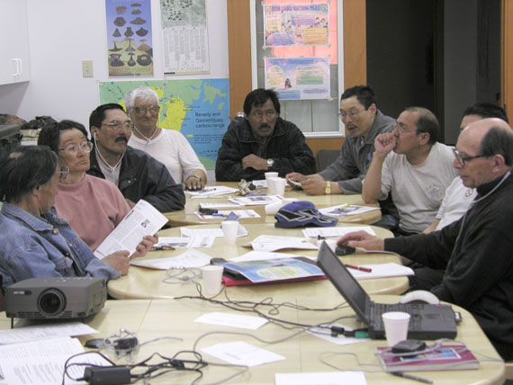 From a May 2002 meeting of the Beverly and Qamanirjuaq Caribou Management Board in Baker Lake, from left to right: Baker Lake's Harold Elegoyoak, Susan Toolooktuk, Joedee Joedee (HTO vice-president), Norman Attungala, David Aksawnee (HTO president), Phillip Putumiraqtuq (HTO secretary-treasurer), Thomas Kudloo and, on the far right, Gunther Abrahamson, who served for many years as secretary to the board. (PHOTO BY GARY KOFINAS)