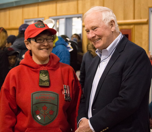 Silaqqi Ashevak shares a smile with the Queen's representative in Canada — Governor General David Johnston — in Cape Dorset May 8. Johnston, and his wife Sharon Johnston, visited Hudson Bay region communities in early May, stopping by at schools, hamlet offices and community centres, starting in Churchill, Man., and ending in Kuujjuaraapik on May 10. (PHOTO BY ERIC LANGDON)