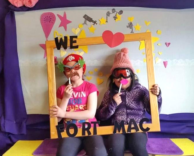 Students at Joamie elementary school in Iqaluit pose for a photo booth fundraiser held May 20, along with other events at the school to raise money to help those who lost their homes in the Fort McMurray wildfire. Their efforts raised more than $4,000. Also this past weekend in Iqaluit: A fundraiser at the Elks club, which between the 50/50 and cover charge at the door, raised $3,125. This amount was matched by the NCC and NCCD for a total amount of $6,250 – which was then matched by Northview, bringing the total to $12,500 donated to the Red Cross Alberta fire relief fund, according to information from the Iqaluit Public Service Facebook page. (PHOTOS COURTESY OF SONJA LONSDALE)