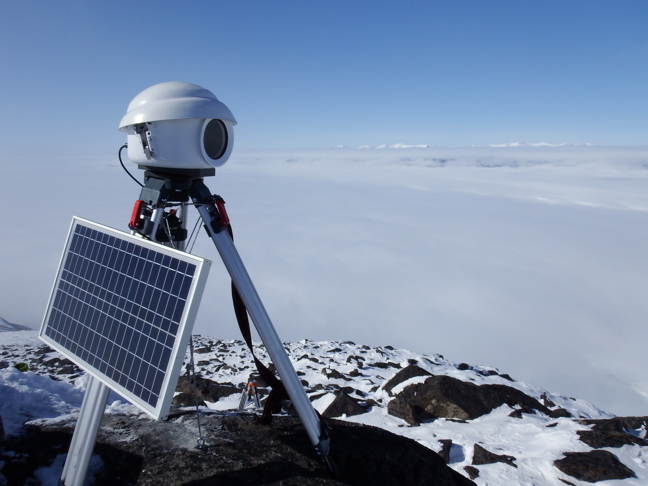 The camera, atop Mt. Herodier about 30 kms east of Pond Inlet on North Baffin Island, is enclosed in a plastic casing and powered by a solar panel and lithium-ion battery pack.