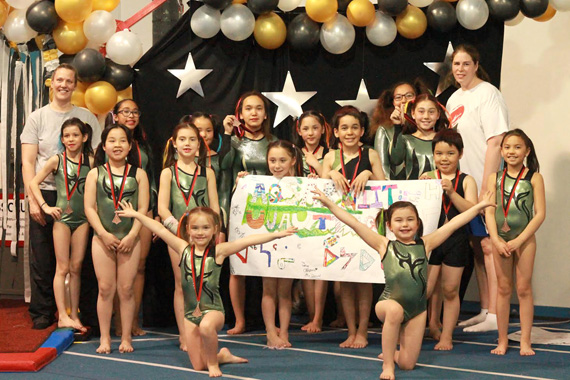Members of Rankin Inlet’s Aqsarniit Ujauttaq Gymnastics club and their coaches Lisa Kresky and Kristen Sawyers celebrate following a May 15 performance at a gymnastics competition in Prince George, British Columbia. Seventeen young athletes from Aqsarniit Ujauttaq (Northern Lights Gymnastics) travelled to British Columbia earlier this month to take part in events in both Richmond and Prince George. (PHOTO COURTESY OF M. STACEY)