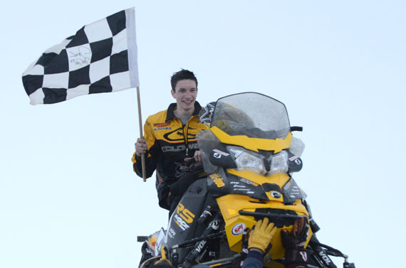 Tristan Dias is hoisted aloft after winning the Kivalliq Challenge cross-country snowmobile race in the senior 600-cc category during the Pakallak Tyme festival held April 24 to May 3 in Rankin Inlet. He took first place ahead of 13 other racers in a final race near Rankin inlet and won $8000 in prize money, plus a trophy and flag autographed by Jordin Tootoo. (PHOTO BY NOEL KALUDJAK)