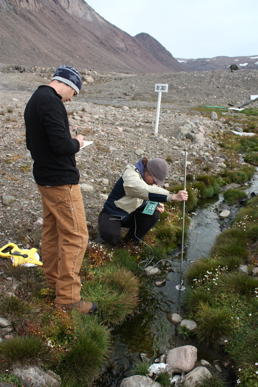 Rob Jamieson, who holds the Canada Research Chair in Cold Regions Ecological Engineering at Dalhousie University in Halifax, with team member Leah Boutilier, sampling water in Grise Fiord in 2010. (PHOTO COURTESY ROB JAMIESON)